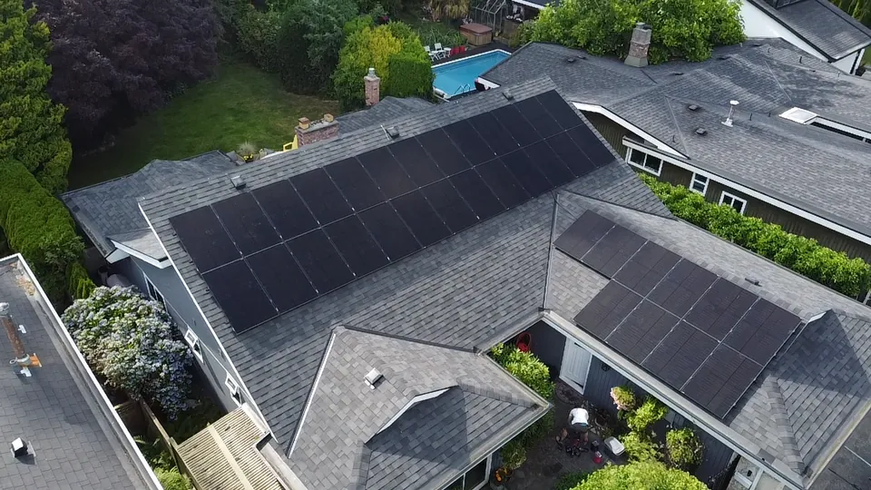 Solar panels installed across a large sloped roof in Crescent Beach, Surrey